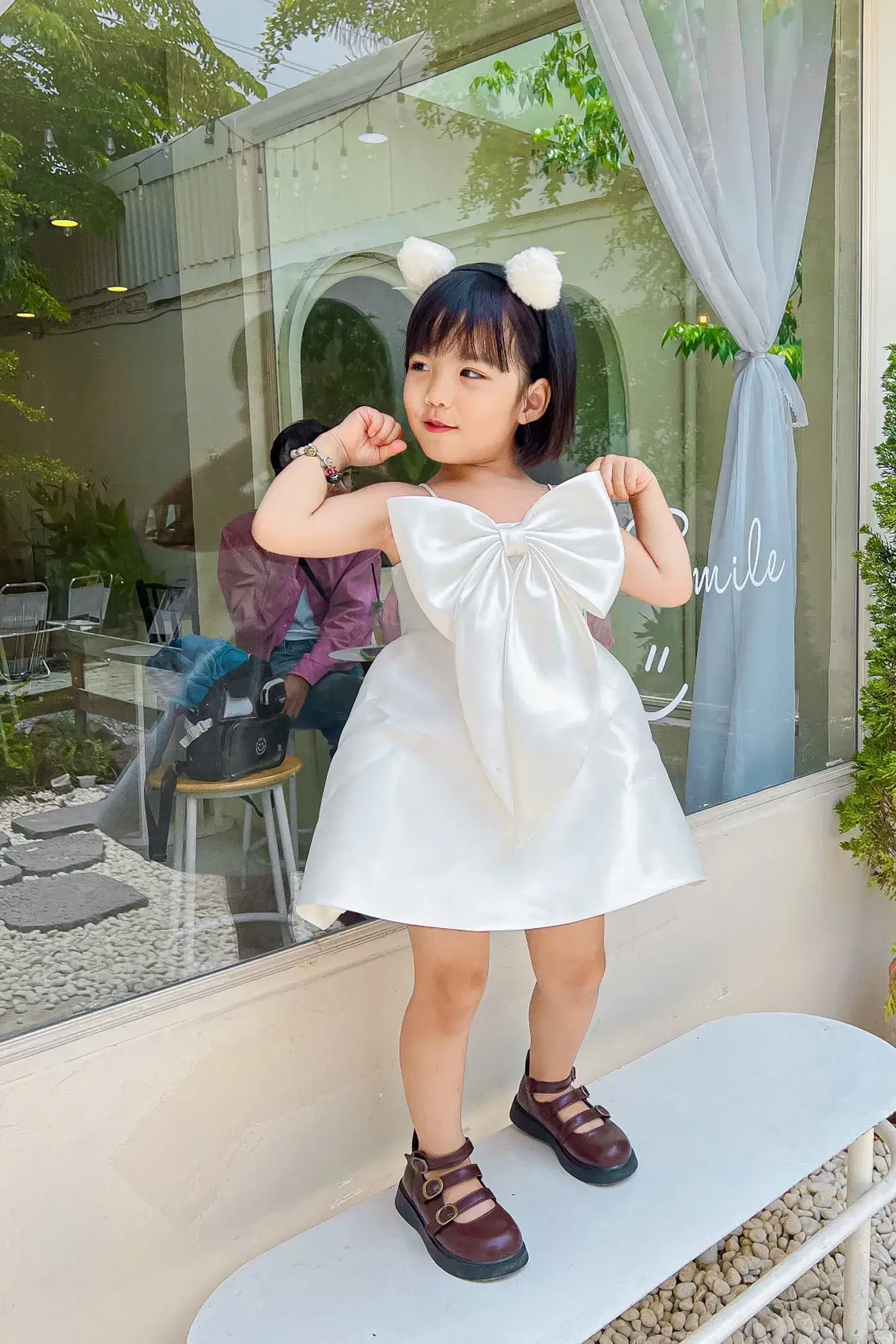 vay-no-lon-cho-be-gai-2 váy nơ lớn cho bé gái 2